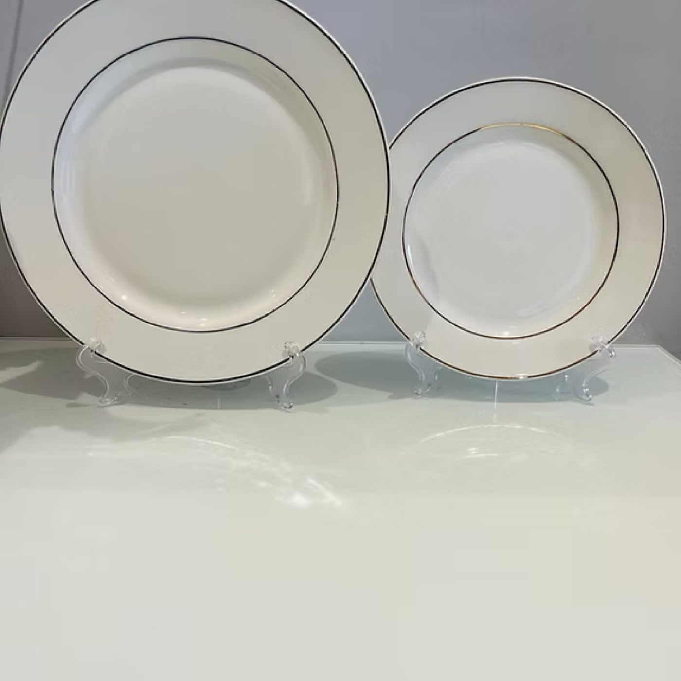 Rimmed white plates